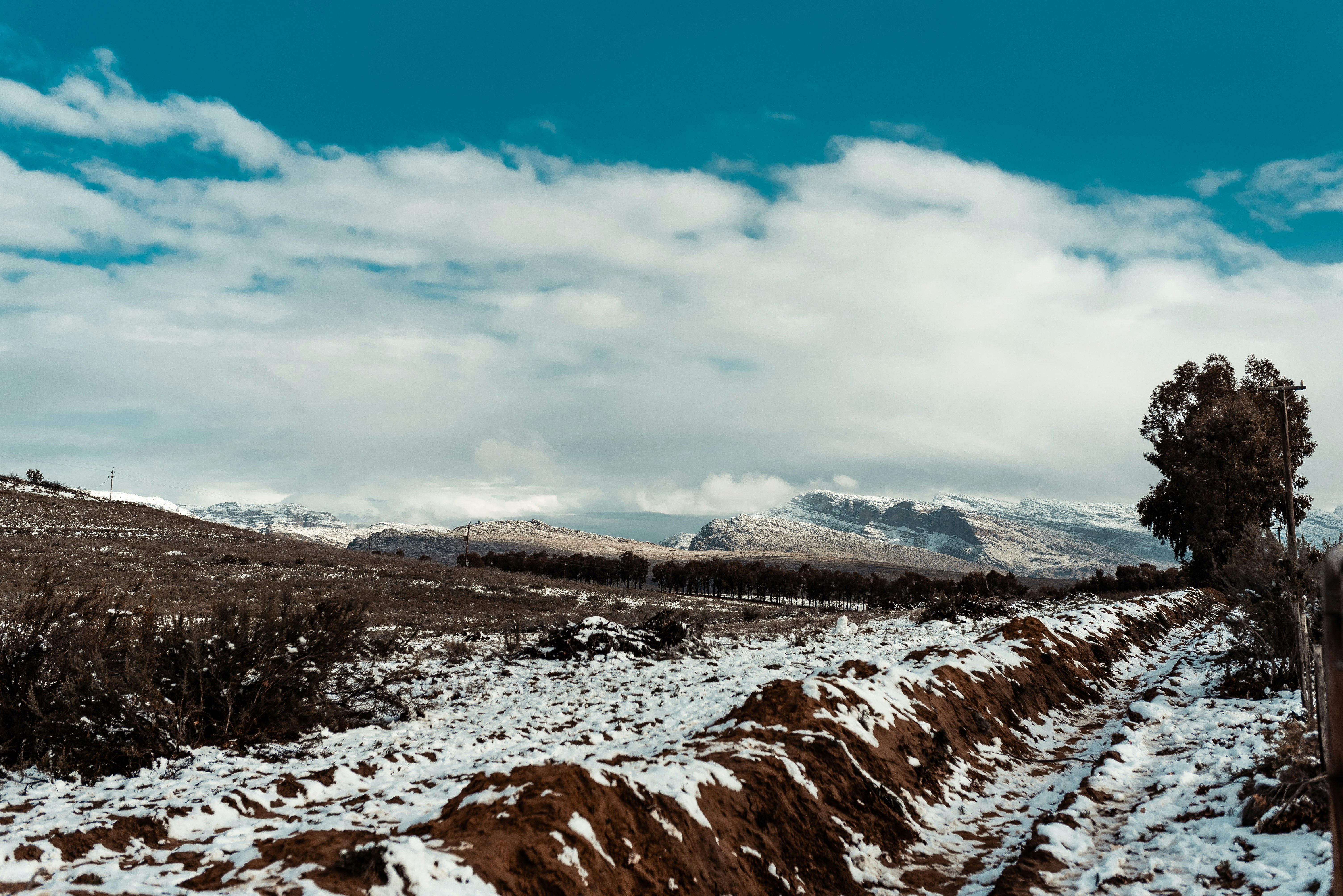 snow covered mountain under blue sky during daytime